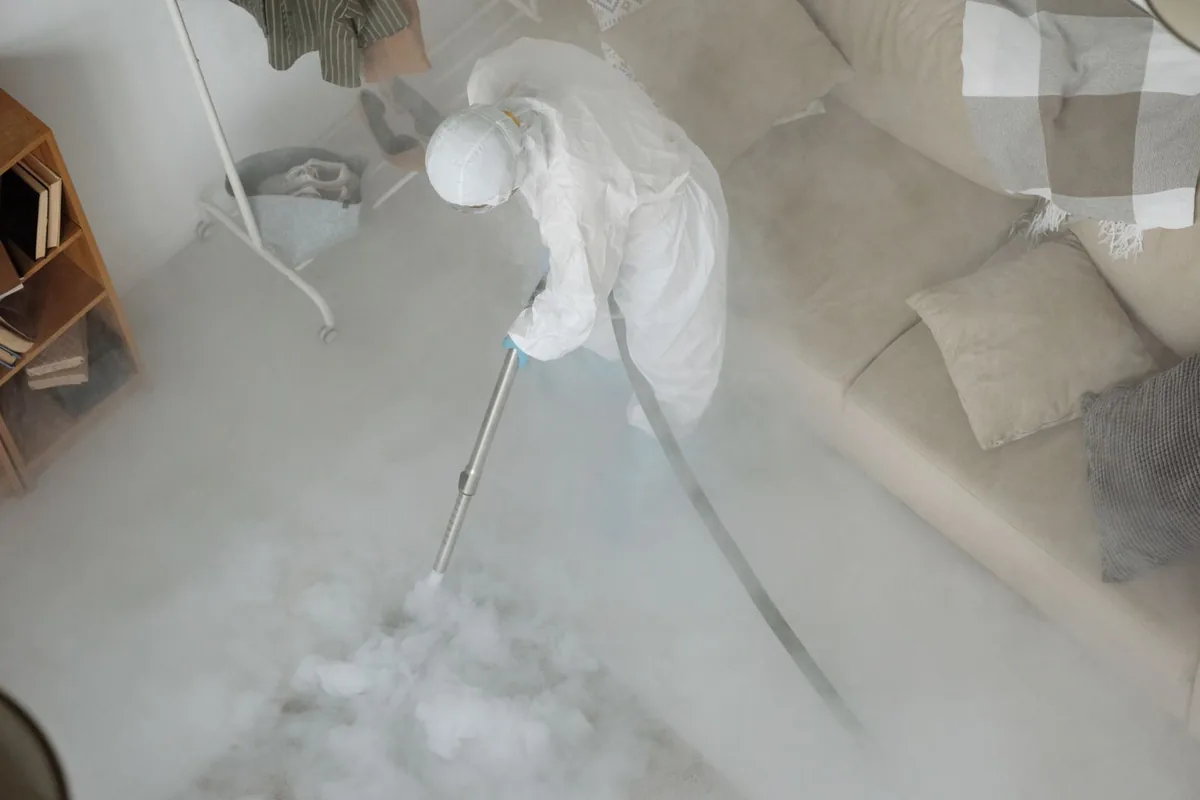 Biohazard cleanup technician in protective equipment, Lebanon, KY